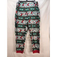 Get Ready For The Holidays In These Disney Minnie Mouse Pajama Pants! Made With Cozy Fleece Fabric, These Pants Are Perfect For Lounging Around The House. The Green Color And Holiday Theme Make Them A Festive Addition To Your Loungewear Collection. These Pajama Pants Are Designed For Women And Come In Size Large. They Feature A Fun Minnie Mouse Pattern And Are Perfect For Any Disney Fan. Whether You're Wearing Them Around The House Or Curling Up With A Good Book, These Pants Are Sure To Bring A Winter Sleepwear With Long Pants, Comfortable Winter Sleepwear With Long Pants, Cozy Winter Pajama Party Pants, Cozy Winter Pants For Pajama Party, Casual Winter Sleepwear With Elastic Waistband, Cozy Winter Bottoms For Pajama Party, Casual Winter Pants For Sleepover, Green Long Pants For Bedtime, Christmas Pajama Party Sleepwear Long Pants