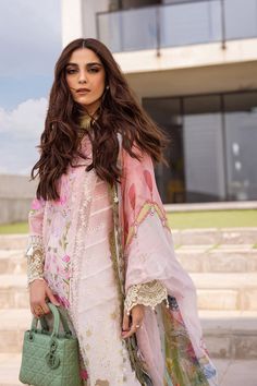 Brand: Saira RizwanProduct Code: SRLL24-01 LAURELCollection: Saira Rizwan Unstitched Luxury Lawn Summer CollectionFabric: Lawn DESIGN DETAILS: Ombre Embroidered and Laser cut Front Center Panel (Lawn + Organza) 1-PC Embroidered Side Panels with Laser Cut (Lawn + Organza) 2-PC Ombre Embroidered Back (Lawn) 1 Yard Dyed Plain Sleeves (Lawn) 0.75 Yard Digital Printed Dupatta (Chiffon) 2.75 Yards Dyed Trouser (Cambric) 2 Yards Accessories: Embroidered Patch for Sleeves (Organza) 2-PC Embroidered Border for Sleeves (Organza) 1.25 Yards Embroidered Border for Front and Back (Organza) 2 Yards Embroidered Front Border (Organza) 3 Yards Lace for Shirt Hem (1 Yard) DISCLAIMER:* Lining, Laces, and Tassels are not included in unstitched variants.* Embellishment items in stitched outfits are subject to Peach Dupatta, Pakistani Clothes Online, Lawn Design, Printed Dupatta, Embroidered Border, Luxury Wear, Eid Collection, Lasercut Design, Luxury Bridal