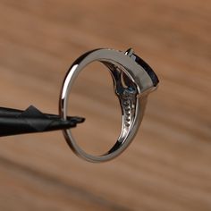 a close up of a ring on a table