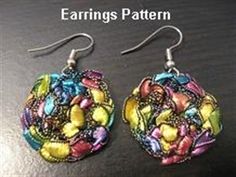 the earrings are decorated with colorful fabric