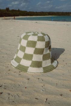 When it comes to cuteness - this hat is a 10. This summer must-have features a playful checkered print and the ability to shape it however you like. Handmade using organic cotton yarn by talented Balinese artisans, each hat takes a full day to create. This is a limited edition item - we've created a limited amount of these and won't be restocking. So get yours now before it's gone for good! Summer Plaid Bucket Hat, Casual Gingham Hats For Summer, Summer Gingham Hat With Curved Brim, Plaid Curved Brim Hat For The Beach, Plaid Curved Brim Hat For Beach, Plaid Hats For Summer Beach, Summer Plaid Brimmed Hat, Plaid Summer Beach Hat, Plaid Bucket Hat For The Beach