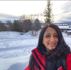 a woman taking a selfie in the snow