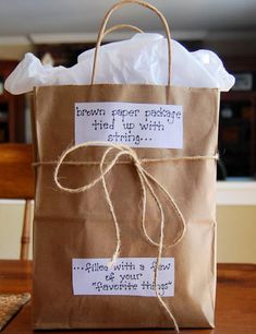 a brown bag with some writing on it and a tag that says, bag of his favorite things i diy valentine's for boyfriend