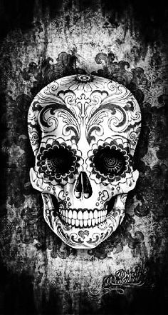 a black and white photo of a sugar skull