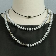 Very modern and elegant piece. This hand knotted white Howlite rondelles necklace is great by itself or as a layering piece. Pave diamond rondelles and faceted silver pyrite beads add a little sparkle and make this necklace more special. Wear this necklace long or double it. Great with : https://www.etsy.com/listing/258023610/beaded-black-spinel-and-silver-pyrite?ref=shop_home_active_23 Necklace is 40 inches long. Check OliverRafCollection for new listings: https://www.etsy.com/your/shops/Oliver White Minimalist Necklace For Layering, Minimalist White Necklace For Layering, White Gemstone Beads Lariat Necklace, White Lariat Necklace With Gemstone Beads, White Single Strand Necklace For Layering, Modern Adjustable Single Strand Necklace, White Hand Knotted Jewelry With Round Beads, Minimalist White Beaded Necklaces With Faceted Beads, Hand Knotted White Round Bead Jewelry