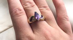 14k Gold Genuine Marquise Cut Amethyst and Diamond Ring Size 6 Condition: Excellent Preloved Condition Markings: 14K, LGL Materials: 14K Gold Measurements: Please refer to the pictures for all measurements. Please message if you would like any additional measurements taken!  Weight: 3.6g Size: 6 Because we want your vintage treasures to fit you perfectly, please rely on the measurements provided, not sizing on labels. Please ensure fit before purchasing as all our vintage sales are final. No returns or exchanges.  Our items are preloved and adored authentic Vintage. This means they may have signs of wear and use and are offered as is. You will receive the exact item shown in the photos. There may be slight color variation depending on your monitor display. Please see pictures as they are p 14k Gold Multi-stone Amethyst Ring For Anniversary, Amethyst And Diamond Ring, Multi Stone Ring, Marquise Cut, Multi Stone, Stone Rings, Diamond Ring, Jewelry Rings, Ring Size