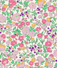 a flowery pattern with many different colors and sizes on the surface, as well as flowers