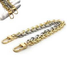 "This premium double purse chain charm accessory is electroplated and polished.  Easily attach both gold clasps unto your handbag and watch it go beyond just a bag charm. You get two functionalities with the bag charm but one functionality with the shoulder bag strap. Handbag Charm 10\"/11\" (clasp size not included in chain length size) (1) Using the bag charm as such; a bag charm (2) Changing the bag charm into a wristlet strap Shoulder Bag Strap Chain (Sizes shown in listing) (1) Use it as a double shoulder strap chain or let it dangle on both ends down creating a fashion statement Measurements CHAIN LENGTH The measurements of the chains are found in the drop down menu. The measurements do not include the clasp length nor the jump ring length, CLASP LENGTH Please refer to the photo of t Silver Metal Chain Link Bag, Gold Metal Bag For Everyday Use, Gold Rectangular Bags With Adjustable Chain, Rectangular Gold Bags With Adjustable Chain, Everyday Chain Metal Bag, Everyday Metal Chain Bags, Gold Metal Bag With Chain, Gold Bags With Adjustable Chain For Gift, Gold Metal Chain Bag