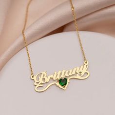 Unveil Your Unique Elegance with Our Shimmering Name Necklace with Birthstone Celebrate the special moments in life with a piece that embodies elegance and thoughtfulness. Our Shimmering Name Necklace with Birthstone is a true testament to fine craftsmanship, meticulously fashioned from premium sterling silver or 18k gold plating. This minimalist masterpiece is the ideal gift for birthdays, anniversaries, or any occasion that calls for something extraordinary. What makes this necklace truly special? It's the personal touch that transforms it into a cherished keepsake. Customize it with a name, a significant date, or a meaningful word, making it a unique symbol of your love and thoughtfulness. Our Shimmering Name Necklace with Birthstone is more than just jewelry – it's a heartfelt gift tha Elegant Engraved Cubic Zirconia Jewelry, Wedding Heart Pendant Jewelry With Birthstone, Delicate Engraved Rose Gold Jewelry, Rose Gold Name Jewelry For Valentine's Day, Elegant Personalized Jewelry For Formal Occasions, Rose Gold Name Engraved Heart Pendant Jewelry, Personalized Gold Plated Necklaces For Wedding, Rose Gold Birthstone Name Necklace For Anniversary, Personalized Gold-plated Necklaces For Wedding