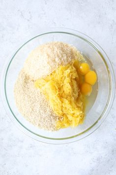 an image of eggs and flour in a bowl