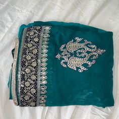 Beautiful Heavy Green Saree With Silver Embroidery Silver Resham Embroidery Saree For Festive Occasions, Festive Silver Saree With Resham Embroidery, Silver Traditional Wear With Intricate Embroidery For Eid, Silver Traditional Wear With Intricate Embroidery For Festive Season, Festive Silver Traditional Wear With Intricate Embroidery, Traditional Silver Saree With Resham Embroidery, Silver Saree With Resham Embroidery For Eid, Festive Silver Saree With Mirror Work, Silver Traditional Wear With Mirror Work