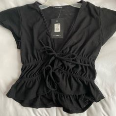 Cute Blouse/Black Top, Never Worn!! Black V-neck Summer Blouse, Black V-neck Top For Beach, Black V-neck Blouse For Day Out, Casual Black Fitted Blouse, Black V-neck Blouse For Beach, Trendy Black Short Sleeve Blouse, Black Beach Tops For Spring, Casual Black Blouse For A Party, Black V-neck Beach Blouse