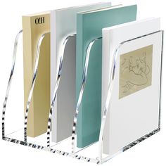 three binders in different colors and designs