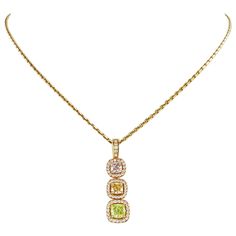 Beautiful necklace in redgold 750 manufactured by famous Swiss Jeweler Gübelin. All three fancy colored diamonds are GIA certified and of natural color. Cushion 0.31 ct (fancy light purplish pink - vs1), Cushion 0.31 ct (fancy yellow orange - si1), Cushion 0.56 ct (fancy yellow green- si1). Further set with 61 brilliant-cut diamonds totaling 0.30 ct. Superb workmanship! Maker's mark: Gübelin Assay mark: 750 Stock no. 1000096887 Diamond Gold Necklace, Victoire De Castellane, Art Deco Pendant Necklace, Platinum Chain, Victorian Pendants, Jaune Orange, Gold Diamond Necklace, Diamond Gold, Fancy Color Diamonds