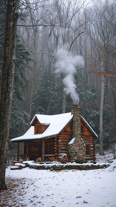 Nestled among the whispering pines of a serene forest, a charming log cabin stands blanketed with a fresh layer of snow. Plumes of smoke gently ascend from the stone chimney, hinting at the warmth and comfort that likely envelops the cabin’s interior. The scene is a picturesque blend of rustic beauty and the quiet hush of winter, evoking a sense of tranquil solitude and the simple joys of a wilderness retreat. Log Cabin Snow, Cozy Cabin In The Woods Aesthetic, Wood Cabin In Forest, Cozy Snow Cabin, Cabin In Forest Aesthetic, Cabins In Winter, Building Log Cabin, Alaska Cabin Interior, Cabin In Winter Woods