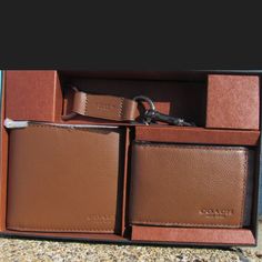 Brand New In Box Men’s Gift Set Of Wallet, Id Case And Keychain By Coach Done In Gorgeous Brown Leather (Coach Lists The Color As “Dark Saddle”). All Three Pieces Are Stamped “Coach New York”. Original Retail $225. Coach Rectangular Wallets As Gift, Brown Wallet As A Gift, Coach Brown Rectangular Wallet, Coach Wallet With Coin Pocket For Gift, Coach Wallet With Coin Pocket As Gift, Coach Wallets With Rfid Blocking As Gift, Classic Coach Wallet As Gift, Rectangular Cognac Wallet Perfect For Gifts, Coach Rectangular Wallet For Formal Occasions