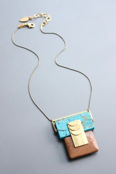 18" necklace with jasper and brass.  2 inch extender. Gold Jasper Necklace With Natural Stones, Handmade Brass Necklace With Rectangular Pendant, Brass Necklace With Adjustable Chain And Rectangular Pendant, Adjustable Gold Jasper Jewelry, Unique Jasper Jewelry With Large Pendant, Artisan Jasper Gold Necklace, Unique Jasper Gold Necklace, Unique Gold Jasper Necklace, Adjustable Brass Jewelry With Large Pendant