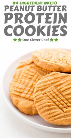 four peanut butter protein cookies on a white plate with the words, one clever chef