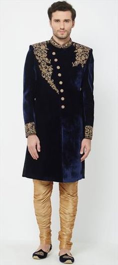 Blue color Sherwani in Velvet fabric with Stone, Zardozi work Blue Dabka Bandhgala For Reception, Royal Kurta For Eid Wedding, Royal Kurta For Wedding And Eid, Royal Wedding Kurta For Eid, Royal Kurta With Zari Work For Festive Occasions, Royal Festive Kurta With Zari Work, Festive Royal Kurta With Zari Work, Royal Bandhgala For Eid, Royal Fitted Kurta For Festive Occasions