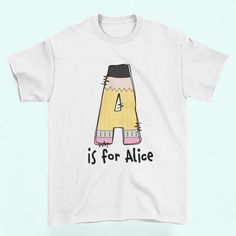 Get ready to go back to school in style with our Combed Cotton T-Shirts. For students, these Back to School shirts are ideal. Our customized school shirts provide your youngster a one-of-a-kind touch with their First Name Initial on a pencil form. These shirts are made of 100% combed ring spun cotton, which makes them pleasant and soft but also long-lasting for regular wear. We exclusively use water-based, environmentally safe inks. Our selection includes something for everyone, whether you're l Personalized Short Sleeve T-shirt For Back To School, Customizable T-shirt For Back To School Events, Back To School Short Sleeve Shirt With Name Print, Customizable T-shirt For School Events And Back To School, Personalized T-shirt For End Of School Year, Customizable T-shirt For School Events, Customizable Casual T-shirt For Back To School, Personalized Tops With School Spirit For Back To School, Back To School T-shirt With Name Print