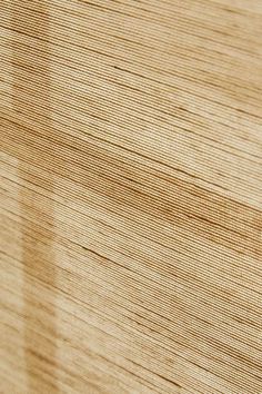 a close up view of the wood grains on a wooden surface with light brown stains