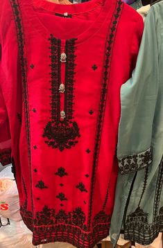 Add this statement to your wardrobe. Red or  green embroidery shirt. it is coordinated with plain pants. and embroidered dupatta. Festive Red Lawn Suit With Zari Work, Red Unstitched Suit With Dabka For Festivals, Designer Red Embroidered Unstitched Suit, Designer Wear Red Embroidered Unstitched Suit, Elegant Red Lawn Suit With Intricate Embroidery, Elegant Red Lawn Suit With Chikankari Embroidery, Festive Red Lawn Suit With Resham Embroidery, Festive Red Lawn Suit With Chikankari Embroidery, Unstitched Red Lawn Suit For Festivals