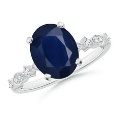 an oval blue sapphire and diamond ring