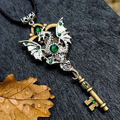 Steampunk dragon necklace. Beautiful pendant green rhinestones. Great gift for you or someone. This pendant is in stock. It will be delivered to you in the USA or Europe in +-7 days! 💌 Made with love and ready to ship. Please avoid contact with water. Gothic Metal Jewelry With Dragon Design, Fantasy Metal Pendant Jewelry, Collectible Gothic Metal Necklace, Gold Fantasy Style Necklace For Fantasy Events, Fantasy Metal Necklaces For Collectors, Metal Dragon Design Jewelry Gift, Fantasy Metal Pendant Necklace, Gothic Nickel-free Necklaces, Metal Jewelry With Dragon Design As Gift