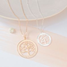 For larger families, any special Mother or Grandmother would cherish this Personalized Large Tree Of Life necklace, hand engraved with the names of their children and grandchildren.18K Champagne Gold Plated, 925 Sterling Silver or 18K Rose Gold PlatedPendant: 3.5cm diameterOptional Dove Charm is available in the Create you Own sectionCharms are removable from this chain and can be worn on all Merci Maman chain lengthsEngraved by hand in our London workshopSent with love in a complimentary gift b Personalized Engraved Jewelry, Meaningful Names, Tree Of Life Necklace, Tree Necklace, Engraved Jewelry, Engraved Necklace, Small Pendant, The Roots, Metal Pendant