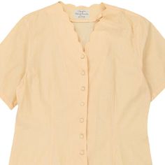 Description:Vintage yellow Benetton blouse, fits large.GENDER: womens CONDITION: very good.STYLE: blouseERA: 1990sCOLOUR: yellowFABRIC: cottonNotes: Size 46. Yellow Cotton V-neck Shirt, Vintage Cotton V-neck Blouse, Vintage Beige V-neck Top, Classic Yellow Summer Blouse, Classic Yellow Cotton Blouse, Vintage V-neck Cotton Blouse, Blouse Fits, Good Style, Beauty Bag