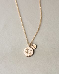 Flowers are our love language—which one speaks to you? Spotlight your favorite bloom with this floral spin on our best-selling Bennett Necklace! Make it extra meaningful with tiny add-on tags personalized with an initial or symbol. Another reason to love this piece: you can add extra initial tags as your story grows! Elegant Charm Necklace With Birth Flower And Initial Pendant, Elegant Charm Necklace With Flower Charm For Personalized Gift, Elegant Flower Charm Necklace For Personalized Gift, Delicate Engraved Charm Necklace, Elegant Everyday Charm Necklace With Birth Flower, Minimalist Rose Gold Birth Flower Jewelry, Rose Gold Minimalist Birth Flower Jewelry, Dainty Jewelry With Birth Flower Initial Pendant, Dainty Initial Pendant Jewelry With Birth Flower