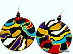 These beautiful earrings was created by sacred divine hands.. Enjoy the Beautiful Energy,  They are most definitely, made for a Queen 🦋 ✨HOT SELLERS ✨ They are hand painted with acrylic (nontoxic) paints on lightweight wood  Glossed with a clear gloss for protection. Size: 3.2in  Sliver Silver earhook wires  Note: items that are handmade/hand painted,  will varies in size, shape or designs.  Clip ons can be added (send a note with order, to adjust) Thanks for supporting Handmade  You are appreciated  Blessings  Artist Khadijah Unity Noir  ✨Earring Godis ✨ Artistic Hand Painted Earrings For Festival, Artistic Hand Painted Festival Earrings, Multicolor Spiritual Drop Earrings, Spiritual Multicolor Drop Earrings, Artisan Earrings With Artistic Design, Artisan Round Earrings With Artistic Design, Artistic Multicolor Earrings With Unique Variations, Unique Artistic Round Earrings, Unique Artistic Design Earrings