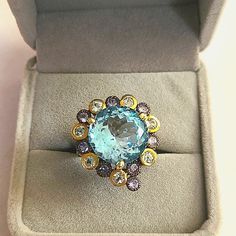 Absolutely Stunning Work Of Art For Your Hand. 19ct African Blue Topaz, 15mm. Sterling Silver With Black Rhodium & Gold Plating. Stamped 925. Small Tanzanite Stones Around. Weight 11g. Center Stone Has No Flaws Visible With 10x Loupe. Sz 8.5 But Can Be Resized At Jeweler. Blue Topaz Is Associated With Wisdom, Communication & Finding The Pathways To Success. It's A Stone That Alleviates Fear And Worries And Invites You To Embrace Your Noble Self & Trust Your Power. It Is The Stone Of Clarity. Off Self Trust, Topaz Cocktail Ring, Boho Rings Gold, Lemon Quartz Ring, Sea Opal, Blue Bubbles, Pave Wedding Rings, Silver Rings Simple, Tanzanite Stone