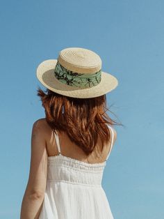 Introducing our "La Isla" Straw Hat with Ribbon Band, a luxurious beach hat made of 100% raffia that transports you to a tropical paradise. Featuring a ribbon band with vibrant floral designs inspired by the natural beauty of Caribbean island life, this handcrafted straw hat is both beautiful and practical. Perfect for sunny days, it's the ideal accessory to add a touch of elegance and island charm to your beachwear. Product Description: Digital printed with floral patterns on ribbon band 2 colo Spring Coastal Boater Hat Made Of Toquilla Straw, Summer Fedora Panama Hat Made Of Palm Leaf, Summer Brimmed Sun Hat Made Of Palm Leaf, Flat Brim Boater Hat For Vacation Travel, Vacation Boater Hat With Flat Brim For Travel, Vacation Travel Boater Hat With Flat Brim, Summer Travel Straw Boater Hat, Summer Brimmed Boater Hat For Garden Party, Adjustable Summer Straw Hat For Garden Party