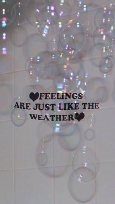 soap bubbles with the words feelings are just like the weather