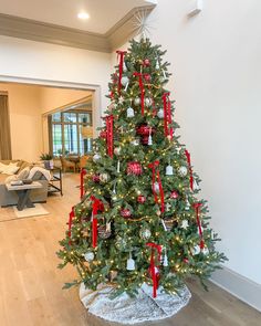 a decorated christmas tree in a living room