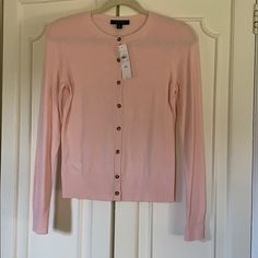 Ann Taylor Light Pink Cardigan. Nwt. Button Up With 8 Tortoise Shell Buttons. Size Xs. Perfect For Year Round Use. Lightweight. Brand New With Tags Attached And Never Even Tried On. Fitted Cotton Sweater With Buttons, Fitted Workwear Cardigan, Fitted Button-up Casual Cardigan, Elegant Pink Sweater With Button Closure, Fitted Cardigan With Button Closure, Elegant Pink Cardigan With Button Closure, Classic Fitted Sweater For Spring, Fitted Classic Sweater For Spring, Fitted Cardigan With Snap Buttons For Work