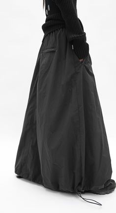 Our Parachute Maxi Skirt offers you a stylish and versatile piece for your wardrobe. Its maxi length and lightweight construction make it perfect for a number of casual looks. Make a statement by pairing with a slim fitting top and a pair of sandals or sneakers. You'll love the comfort and style this skirt provides.
Gender: WomenMaterial: NylonSkirt Length: Mid-Ankle LengthWaist Type: Elastic Waist Parachute Skirt Pattern, Parachute Skirt Outfit, Archive Clothing, Parachute Skirt, Armor Clothing, Wardrobe Planning, Modesty Fashion, All Black Looks, Cool Fits