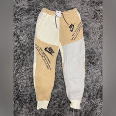 Brand New Nike Tech Fleece Slim Fit Jogger Pant Dm6480 252 Cream Tan Men Sizes Khaki Athleisure Pants For Streetwear, Sporty Brown Bottoms For Outdoor, Beige Sports Bottoms With Pockets, Sporty Beige Streetwear Bottoms, Sporty Brown Streetwear Pants, Brown Athleisure Pants For Streetwear, Khaki Athleisure Bottoms For Streetwear, Nike Beige Cotton Bottoms, Nike Casual Beige Bottoms