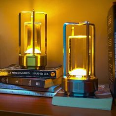 a lamp that is on top of some books