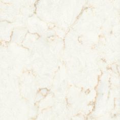 a white marble textured surface with gold veining