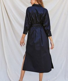 This classic poplin midi dress features a collared neckline, long sleeves, side pockets and a covered buckled belt. A timeless look that is so chic, this dress can be styled work or play. 100% cotton Button down front Unlined, non-sheer, lightweight Model is wearing a size small and is 5'10" Belted Shirt Dress, Drawstring Shorts, Gift Accessories, Belted Dress, Clothes Gift, Dark Navy, Chiffon Tops, Sales Gifts, Jewelry Sales