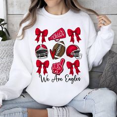 Custom Football Coquette Bow Sweatshirt, Bow Mascot Sweatshirt, Football Cheer Sweatshirt, Football Team Sweatshirt, Bow School Sweatshirt, Cheer Mama Sweatshirt,  Hello there! Welcome to ☆Star Fashion Sweatshirt☆ store.  We are here for different and top quality models. All of your designs that we hope you will like in our store are specially designed and produced for you. Do not hesitate to review. ☆Enjoy comfort and elegance. The material is a thick cotton and polyester blend. It is also a gr White Long Sleeve Tops For Fan Gear, White Team Spirit T-shirt For Fall, Football Season Long Sleeve T-shirt With Team Logo, Long Sleeve Football Season T-shirt With Team Logo, Long Sleeve T-shirt With Team Logo For Football Season, White Tops With Team Logo For Football Season, Long Sleeve Tops For Football Season Fan Merchandise, Sports Fan Tops For Game Day In Winter, White Winter Sweatshirt For Sports Events