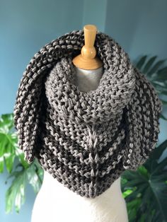 Hand Knit Outlander Inspired Season 4 Claire's Cowl, Chunky Knit, Shawl, Neck Warmer in gray/taupe color. The shawl is made from a 25% merino wool, 25% alpaca and 50% acrylic yarn. CARE: Wash in cold water, gentle cycle, lay flat to dry. The wing span is approximately: XS-S - 64-66 inches, M-L - 74-76 inches, XL-L - 82-86 inches. The knitted fabric is flexible and stretchy. All items are made from a high quality yarn in a pet and smoke free home studio. Knit Play Love is a one-woman operation. I Winter Knitted Acrylic Yarn Shawl, Winter Knitted Acrylic Shawl, Winter Acrylic Yarn Knit Shawl, Knit Acrylic Yarn Scarves, Knitted Alpaca Shawl Scarf, Winter Acrylic Knitted Shawl, Winter Knitted Yarn Shawl, Cozy Merino Wool Shawl For Winter, One Size Knitted Shawl In Acrylic Yarn