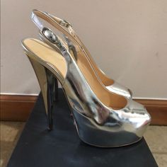 Giuseppe Zanotti Size 6.5 Metallic Silver Pump. Sling Back With 130 Ml Heel. Good Condition. Comes With Box And Dust Bag Zanotti Shoes, Giuseppe Zanotti Shoes, Silver Pumps, Sling Back, Giuseppe Zanotti, Shoes Women Heels, Metallic Silver, Shoes Heels, Dust Bag