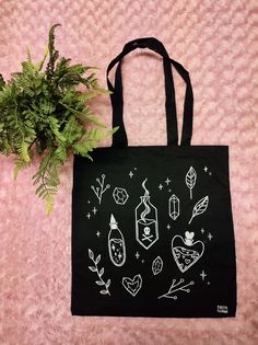 100% Cotton -one of a kind  -hand painted black tote bag -38cm x 42cm -handles are 32.5 cm long -packaged and mailed in eco friendly packaging 💚 -machine wash as normal and leave to air dry Magic Potions, Bee Sticker, Thank You Greetings, Packaging Machine, Square Art, Bullet Journal Stickers, Eco Bag, Save The Bees, Autumn Wreaths