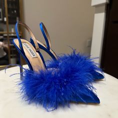 Beautiful Brand New, Never Worn! Deep Royal Blue Satin Heel With Feather Embellishment! Size 7 Blue Slingback Pumps With 4-inch Heel For Evening, Blue Pointed Toe Slingback Pumps For Party, Blue High Heel Slingback Pumps For Evening, Chic Blue Slingback Pumps For Party, Blue Slingback Pumps With Round Toe For Party, Blue Closed Toe Slingback Pumps For Evening, Blue Open Toe Slingback Pumps For Party, Blue Ankle Strap Slingback Pumps For Party, Blue Slingback Pumps For Formal Occasion