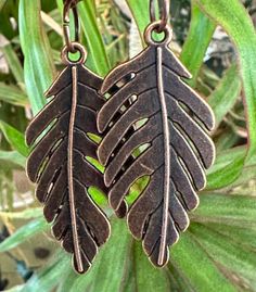 "Pretty double sided copper double sided leaf Pendant, large leaf pendant, antique copper leaf that is 45x23mm. It dangles right at 2\" on copper Lever Backs.  A simple design but large enough to be noticed.  Great earrings for anytime of year. UniquelybyRuth pays for your first class shipping when your order is $35 or more, so take a look around the shop and see if anything else calls to you! 🆓" Elegant Copper Leaf Jewelry, Unique Copper Leaf Jewelry, Gold Flower-shaped Copper Earrings, Bronze Copper Leaf-shaped Jewelry, Ornate Antique-finish Copper Jewelry, Copper Leaf, Leaf Pendant, Double Face, Pendant Earrings