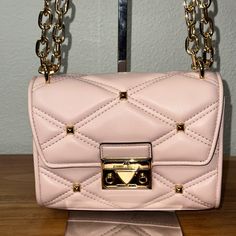 Vegan Leather 7.5" X 5.5" X 2.5" Pink Shoulder Bag With Gold-tone Hardware For Evening, Michael Kors Blush Shoulder Bag With Gold-tone Hardware, Michael Kors Luxury Shoulder Bag In Blush, Michael Kors Luxury Blush Shoulder Bag, Michael Kors Pink Shoulder Bag For Evening, Luxury Michael Kors Blush Shoulder Bag, Pink Shoulder Bag With Gold-tone Hardware For Party, Luxury Blush Michael Kors Shoulder Bag, Luxury Michael Kors Bag In Blush