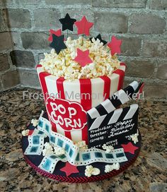 a cake made to look like a popcorn bucket